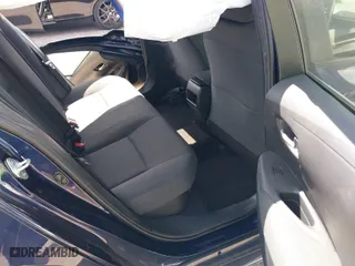 2020 Toyota Corolla Hybrid LE with VIN JTDEBRBE8LJ031556, listed as a IAAI auction lot 41576129 with 103,989 mi miles. Bid and sale history available at carsss.com. Image 8.