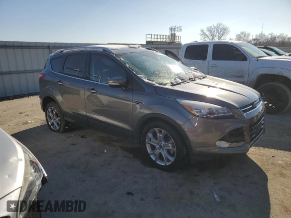 2014 Ford Escape Titanium with VIN 1FMCU9J90EUE48236, listed as a Copart auction lot 85134724 with 64,162 mi miles and Salvage Title. Bid and sale history available at carsss.com. Image 4.