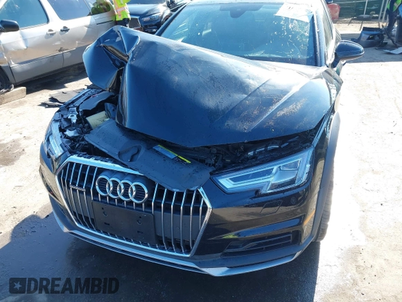 2019 Audi A4 allroad Premium Plus z VIN WA18NAF42KA009729, wystawiony jako IAAI lot #41698959 z przebiegiem 60 893 mil mil oraz . Historia ofert i sprzedaży dostępna na DreamBid. Obrazek 6.