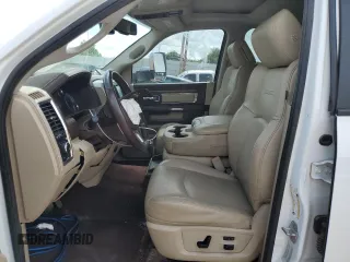 2015 Ram 2500 Laramie with VIN 3C6UR5NL4FG569422, listed as a Copart auction lot 62017655 with 100,400 mi miles and Salvage title. Bid and sale history available at DreamBid. Image 7.