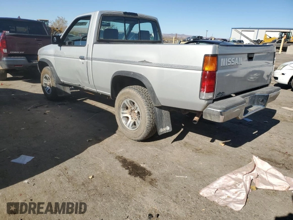 1996 Nissan Frontier XE z VIN 1N6SD11Y5TC327761, wystawiony jako Copart lot #79662594 z przebiegiem 151 631 mil mil oraz Szkoda całkowita • Salvage title. Historia ofert i sprzedaży dostępna na DreamBid. Obrazek 2.