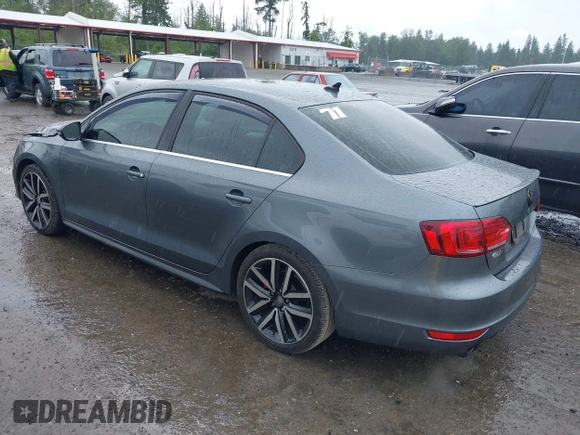 2014 Volkswagen Jetta GLI z VIN 3VW4T7AJ2EM208598, wystawiony jako IAAI lot #42381855 z przebiegiem 82 761 mil mil oraz . Historia ofert i sprzedaży dostępna na DreamBid. Obrazek 3.