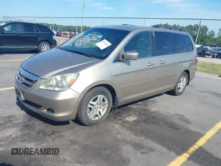 2005 Honda Odyssey EX-L z VIN 5FNRL38735B111376, wystawiony jako IAAI lot #42378824 z przebiegiem 191 632 mil mil oraz . Historia ofert i sprzedaży dostępna na DreamBid. Obrazek 2.