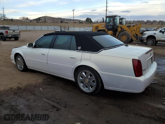 2004 Cadillac DeVille DTS z VIN 1G6KF57944U122824, wystawiony jako Copart lot #86147994 z przebiegiem 118 156 mil mil oraz Szkody całkowita. Historia ofert i sprzedaży dostępna na DreamBid. Obrazek 2.