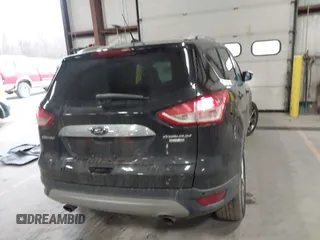 2015 Ford Escape Titanium z VIN 1FMCU0JX9FUB48089, wystawiony jako IAAI lot #41048127 z przebiegiem 133 439 mil mil oraz . Historia ofert i sprzedaży dostępna na DreamBid. Obrazek 16.