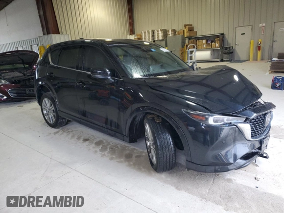 2023 Mazda CX-5 Signature with VIN JM3KFBXY6P0235017, listed as a Copart auction lot 45979615 with 14,487 mi miles and Salvage Title. Bid and sale history available at carsss.com. Image 4.