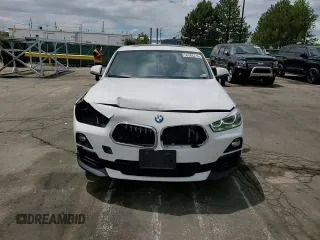 2018 BMW X2 xDrive28i z VIN WBXYJ5C38JEF79686, wystawiony jako Copart lot #56988735 z przebiegiem 103 799 mil mil oraz Szkoda całkowita • Salvage title. Historia ofert i sprzedaży dostępna na DreamBid. Obrazek 13.