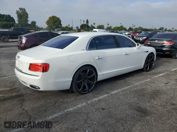 2015 Bentley Flying Spur z VIN SCBEC9ZAXFC041601, wystawiony jako Copart lot #62028895 z przebiegiem 43 943 mil mil oraz Szkoda całkowita • Salvage title. Historia ofert i sprzedaży dostępna na DreamBid. Obrazek 3.