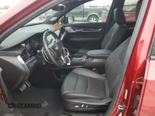 2023 Cadillac XT6 AWD Sport z VIN 1GYKPGRS5PZ221207, wystawiony jako Copart lot #41876425 z przebiegiem 23 193 mil mil oraz Szkody całkowita. Historia ofert i sprzedaży dostępna na DreamBid. Obrazek 7.