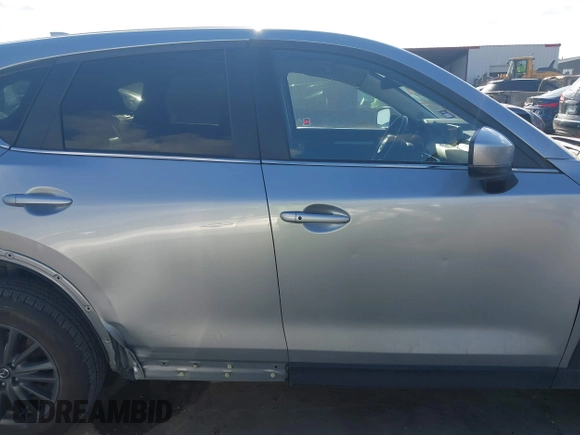 2020 Mazda CX-5 Touring with VIN JM3KFACMXL1786200, listed as a IAAI auction lot 41506139 with 121,944 mi miles. Bid and sale history available at carsss.com. Image 14.
