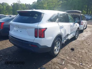 2023 Kia Sorento LX with VIN 5XYRG4LC0PG200896, listed as a IAAI auction lot 42056168 with 67,923 mi miles and . Bid and sale history available at DreamBid. Image 4.