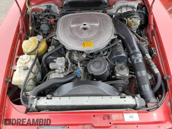 1989 Mercedes-Benz 560 SL с VIN WDBBA48D5KA103768, выставлен на аукционе Copart как лот 71965504 с пробегом 93 239 миль миль и Списание • Salvage title. История ставок и продаж доступна на DreamBid. Изображение 11.