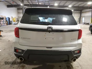 2024 Honda Passport EX-L z VIN 5FNYF8H59RB023744, wystawiony jako Copart lot #83626984 z przebiegiem 4680 mil mil oraz Szkoda całkowita • Salvage title. Historia ofert i sprzedaży dostępna na DreamBid. Obrazek 6.