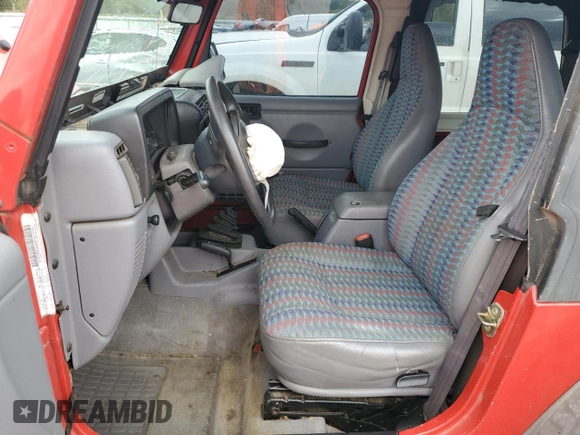1997 Jeep Wrangler Sport with VIN 1J4FY19S1VP548675, listed as a Copart auction lot 66413504 with 0 mi miles and Salvage Title. Bid and sale history available at carsss.com. Image 7.