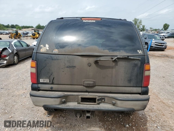 2002 Chevrolet Tahoe LT with VIN 1GNEC13Z52R303777, listed as a Copart auction lot 54942055 with 291,043 mi miles and Salvage title. Bid and sale history available at DreamBid. Image 6.