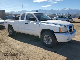 2006 Dodge Dakota SLT with VIN 1D7HW42K86S609668, listed as a Copart auction lot 80587354 with 238,688 mi miles and Salvage Title. Bid and sale history available at carsss.com. Image 4.