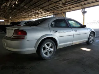 2004 Dodge Stratus SXT z VIN 1B3EL46X44N302796, wystawiony jako Copart lot #71885804 z przebiegiem 293 436 mil mil oraz Tytuł czysty. Historia ofert i sprzedaży dostępna na DreamBid. Obrazek 3.
