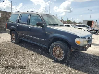 2000 Ford Explorer XLS z VIN 1FMZU62X6YZB94402, wystawiony jako Copart lot #58766885 z przebiegiem Nie podano mil oraz Tytuł czysty. Historia ofert i sprzedaży dostępna na DreamBid. Obrazek 4.