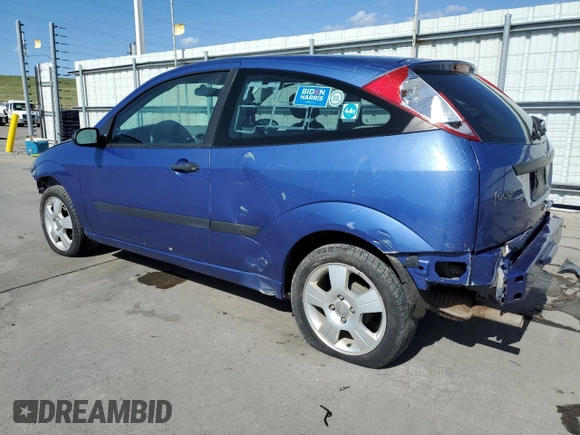 2004 Ford Focus ZX3 with VIN 3FAFP313X4R123879, listed as a Copart auction lot 54052055 with 174,692 mi miles and Salvage Title. Bid and sale history available at carsss.com. Image 2.