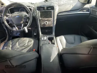 2020 Ford Fusion Titanium z VIN 3FA6P0D96LR205475, wystawiony jako Copart lot #56313075 z przebiegiem 30 888 mil mil oraz Szkoda całkowita • Salvage title. Historia ofert i sprzedaży dostępna na DreamBid. Obrazek 8.