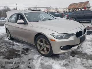 2014 BMW 3 Series 328i xDrive with VIN WBA3B5G52ENS09642, listed as a IAAI auction lot 41703927 with 109,402 mi miles and . Bid and sale history available at DreamBid. Image 1.