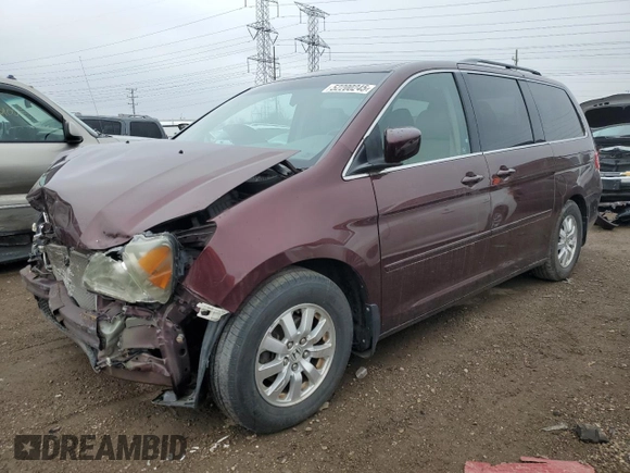 2010 Honda Odyssey EX-L with VIN 5FNRL3H62AB007415, listed as a Copart auction lot 52200245 with 184,601 mi miles and Salvage Title. Bid and sale history available at DreamBid. Image 1.