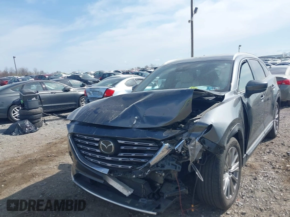 2021 Mazda CX-9 Signature with VIN JM3TCBEY5M0523199, listed as a IAAI auction lot 41916480 with 56,772 mi miles. Bid and sale history available at carsss.com. Image 6.