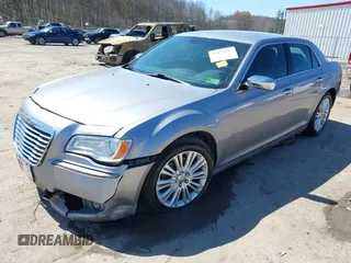 2014 Chrysler 300 C with VIN 2C3CCAKG6EH379114, listed as a IAAI auction lot 41992957 with 151,949 mi miles and . Bid and sale history available at carsss.com. Image 2.