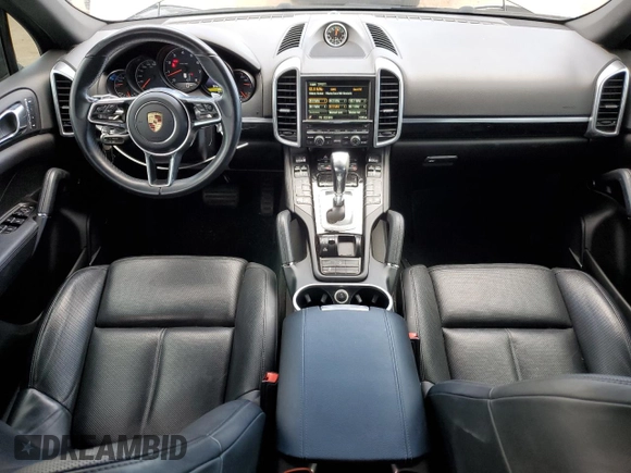 2016 Porsche Cayenne z VIN WP1AA2A21GKA10062, wystawiony jako Copart lot #64639685 z przebiegiem 52 962 mil mil oraz Szkoda całkowita • Salvage title. Historia ofert i sprzedaży dostępna na DreamBid. Obrazek 8.