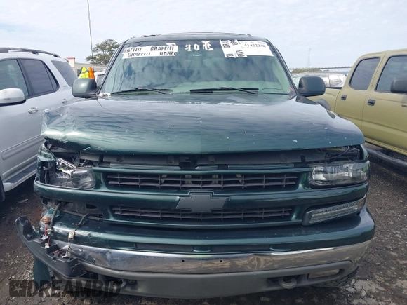 2001 Chevrolet Suburban LS with VIN 3GNGK26U11G231007, listed as a IAAI auction lot 41452238 with 339,628 mi miles. Bid and sale history available at carsss.com. Image 12.