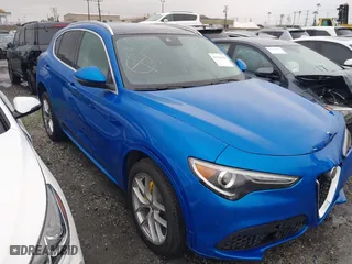 2021 Alfa Romeo Stelvio Ti with VIN ZASPAKBN0M7D18611, listed as a IAAI auction lot 41104626 with 30,188 mi miles. Bid and sale history available at carsss.com. Image 1.