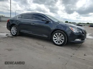 2014 Buick LaCrosse Leather with VIN 1G4GB5G39EF177040, listed as a Copart auction lot 54257695 with 128,690 mi miles and Salvage Title. Bid and sale history available at DreamBid. Image 4.