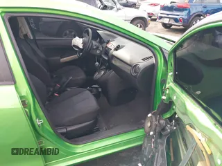 2012 Mazda 2 Sport with VIN JM1DE1KZ4C0140559, listed as a IAAI auction lot 41265959 with 139,364 mi miles and . Bid and sale history available at DreamBid. Image 5.