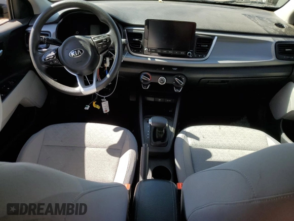 2021 Kia Rio S with VIN 3KPA25AD3ME382938, listed as a Copart auction lot 48777325 with Not Provided miles and Salvage Title. Bid and sale history available at DreamBid. Image 8.