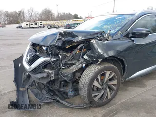 2017 Nissan Murano Platinum z VIN 5N1AZ2MH1HN186471, wystawiony jako IAAI lot #41233284 z przebiegiem 135 135 mil mil oraz . Historia ofert i sprzedaży dostępna na DreamBid. Obrazek 6.