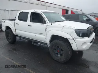2005 Toyota Tacoma z VIN 5TELU42N05Z063916, wystawiony jako IAAI lot #41101779 z przebiegiem 156 269 mil mil oraz . Historia ofert i sprzedaży dostępna na DreamBid. Obrazek 1.