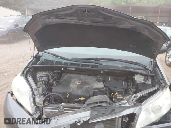 2014 Toyota Sienna L with VIN 5TDZK3DC8ES470837, listed as a IAAI auction lot 42426844 with 302,661 mi miles and . Bid and sale history available at DreamBid. Image 10.
