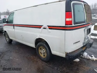 2006 Chevrolet Express Cargo Van with VIN 1GCFG15X261155976, listed as a IAAI auction lot 41562836 with 295,351 mi miles. Bid and sale history available at carsss.com. Image 3.