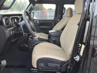 2022 Jeep Wrangler Unlimited Sport with VIN 1C4HJXDNXNW199299, listed as a Copart auction lot 67140934 with 30,996 mi miles and Salvage Title. Bid and sale history available at DreamBid. Image 7.
