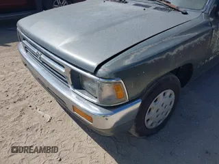 1993 Toyota Pickup DLX z VIN JT4RN93P3P5069851, wystawiony jako IAAI lot #41950116 z przebiegiem 209 937 mil mil oraz . Historia ofert i sprzedaży dostępna na DreamBid. Obrazek 14.