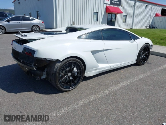 2009 Lamborghini Gallardo z VIN ZHWGU54T59LA07777, wystawiony jako IAAI lot #39749159 z przebiegiem 8730 mil mil oraz . Historia ofert i sprzedaży dostępna na DreamBid. Obrazek 4.