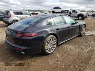 2018 Porsche Panamera 4 E-Hybrid z VIN WP0AE2A72JL127720, wystawiony jako Copart lot #71872404 z przebiegiem Nie podano mil oraz Szkoda całkowita • Salvage title. Historia ofert i sprzedaży dostępna na DreamBid. Obrazek 3.