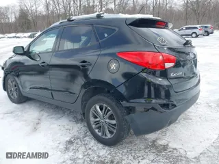 2015 Hyundai Tucson SE with VIN KM8JU3AG2FU103035, listed as a IAAI auction lot 41592256 with 105,792 mi miles. Bid and sale history available at carsss.com. Image 3.