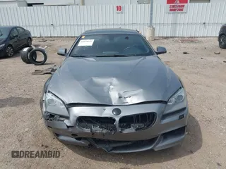 2014 BMW 6 Series 650i z VIN WBA6B2C55ED128934, wystawiony jako IAAI lot #42070641 z przebiegiem 102 597 mil mil oraz . Historia ofert i sprzedaży dostępna na DreamBid. Obrazek 12.