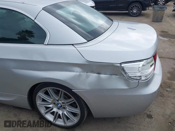 2010 BMW 3 Series 335i with VIN WBAWL7C53AP474127, listed as a IAAI auction lot 41871518 with 111,136 mi miles. Bid and sale history available at carsss.com. Image 6.