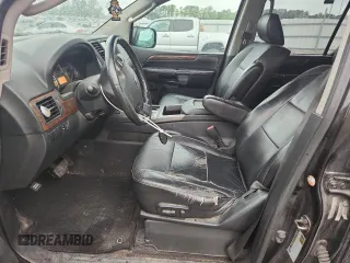 2010 Nissan Armada Titanium z VIN 5N1BA0ND0AN619506, wystawiony jako Copart lot #58329005 z przebiegiem 212 496 mil mil oraz Szkoda całkowita • Salvage title. Historia ofert i sprzedaży dostępna na DreamBid. Obrazek 7.