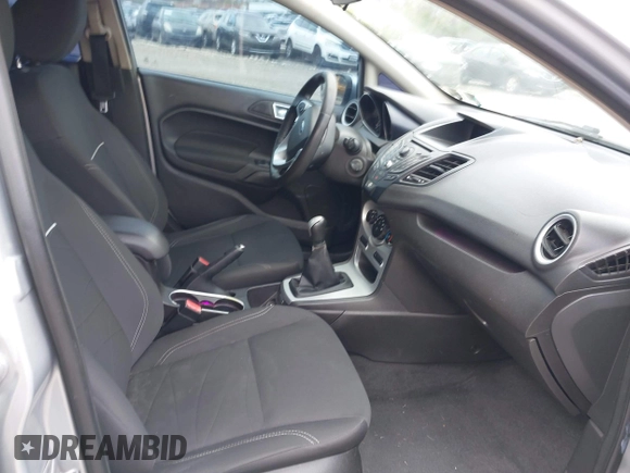 2014 Ford Fiesta SE with VIN 3FADP4BJ1EM206951, listed as a IAAI auction lot 42059193 with 174,950 mi miles. Bid and sale history available at carsss.com. Image 5.