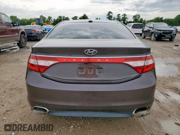 2015 Hyundai Azera Limited z VIN KMHFH4JG7FA483586, wystawiony jako Copart lot #61013125 z przebiegiem 127 766 mil mil oraz Czysty tytuł • Clean title. Historia ofert i sprzedaży dostępna na DreamBid. Obrazek 6.