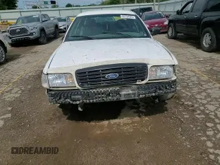 2007 Ford Police Interceptor z VIN 2FAFP71W57X156098, wystawiony jako Copart lot #62784325 z przebiegiem Nie podano mil oraz Szkoda całkowita • Salvage title. Historia ofert i sprzedaży dostępna na DreamBid. Obrazek 13.