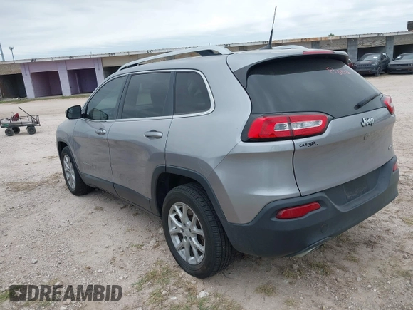 2018 Jeep Cherokee Latitude with VIN 1C4PJLCX4JD559096, listed as a IAAI auction lot 41925282 with 127,488 mi miles and . Bid and sale history available at DreamBid. Image 3.